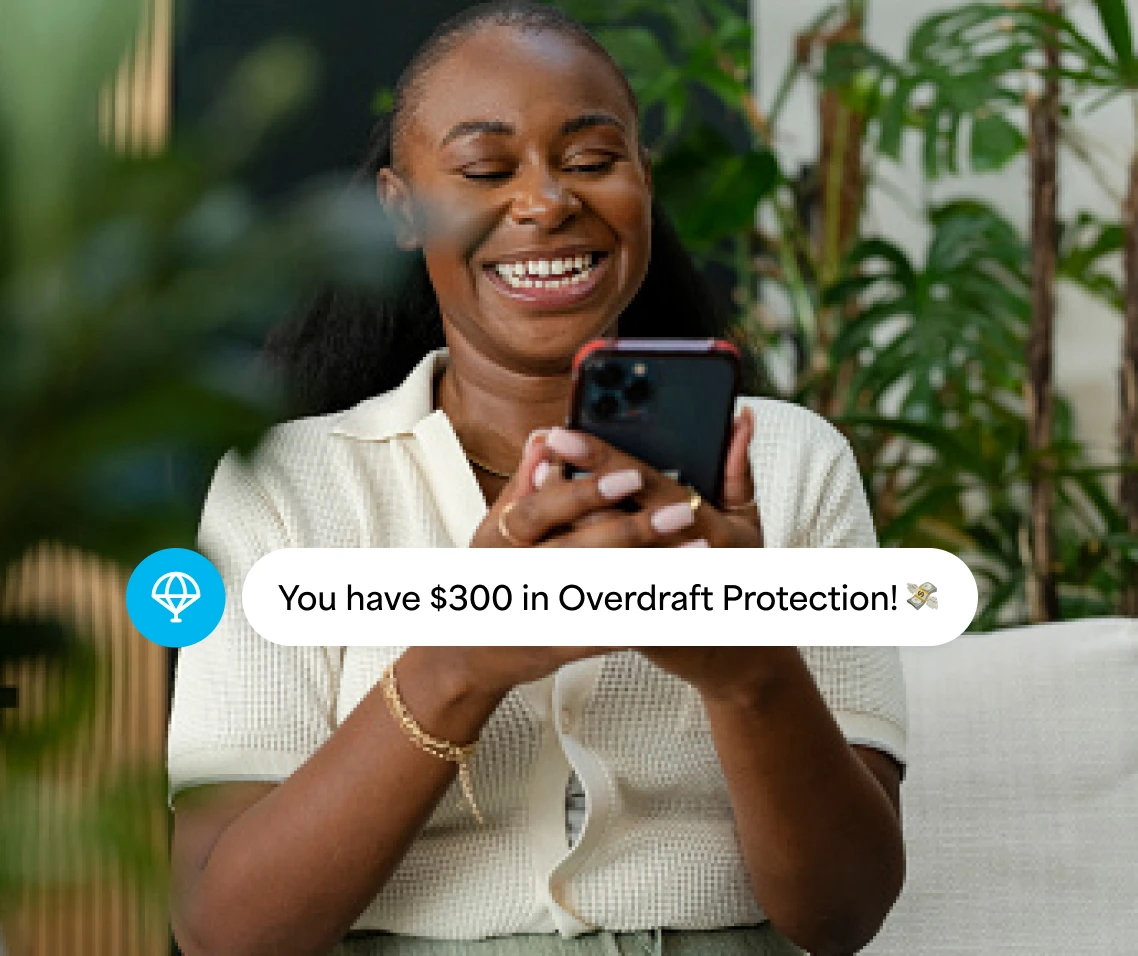 Woman happy for having $300 in Overdraft Protection